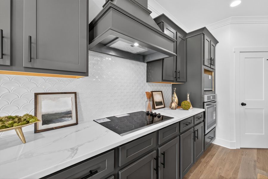 Furnished interior in a model home at Cotton Creek in Good Hope (Image 8).