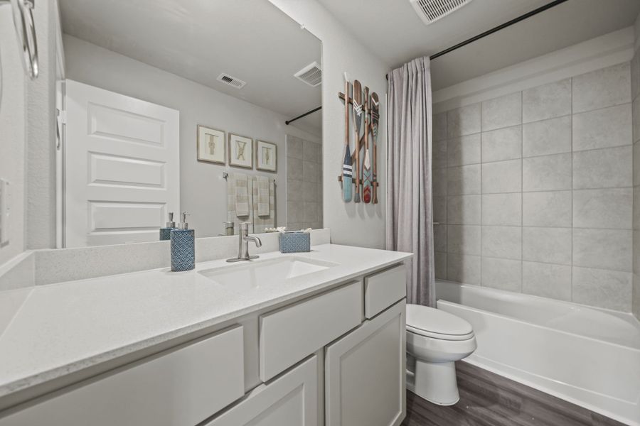Furnished interior in a model home at Grand Magnolia in Magnolia (Image 28).