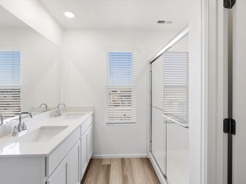 Furnished interior in a model home at Frontier Estates - The Trails Collection in Firestone (Image 17).
