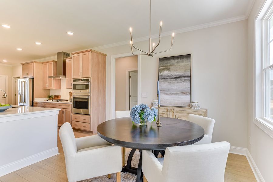 The breakfast nook provides a flexible dining space, ideal for quick meals or connection The breakfast nook provides a flexible dining space, ideal for quick meals or connection