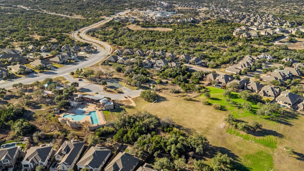 Aerial view of the Sola Vista at West Cypress Hills community in Briarcliff, TX, showing layout and nearby surroundings (Image 7). Aerial view of the Sola Vista at West Cypress Hills community in Briarcliff, TX, showing layout and nearby surroundings (Image 7).