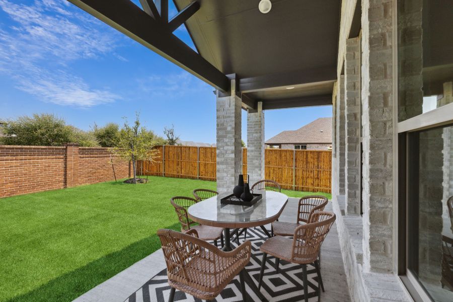 Covered patio of a LakePointe new Home in Lavon TX by Trophy Signature Homes