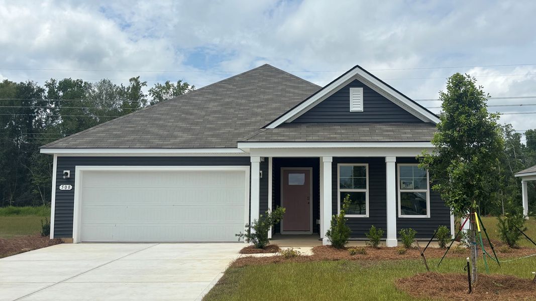 Front exterior of a home in the Dove Crossing community, located in Conway, SC (Image 11).