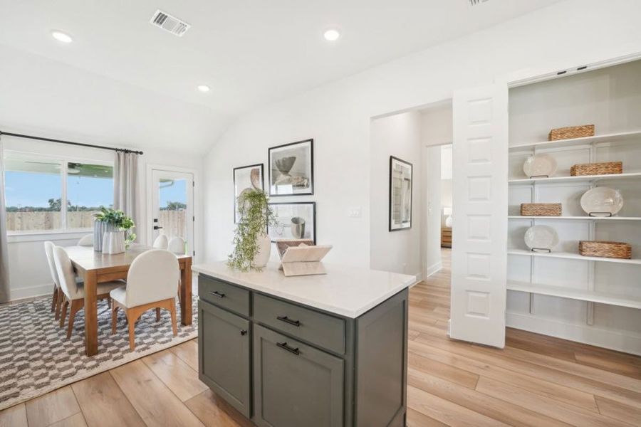 Furnished interior in a model home at Grande Estates in Bertram (Image 18).