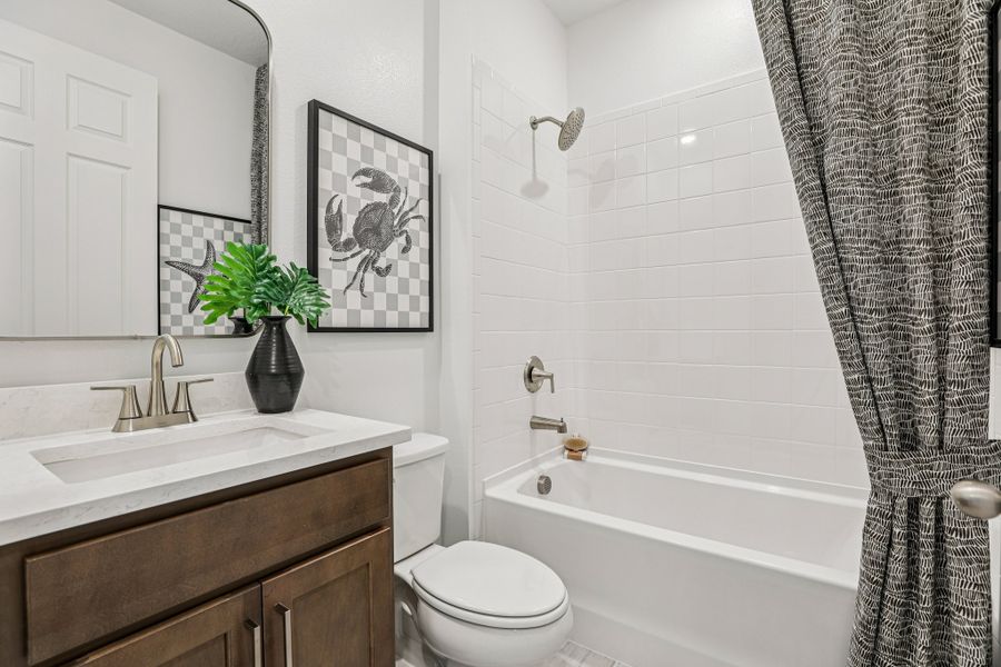 Furnished interior in a model home at Country Club Estates in Palm Bay (Image 9).