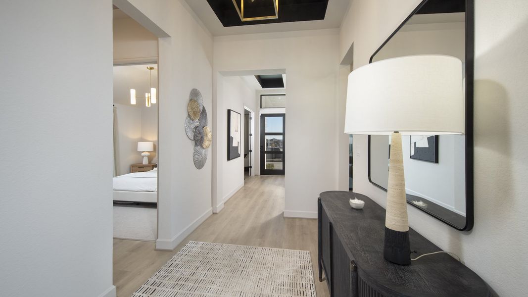 Furnished interior in a model home at Lariat 60' in Liberty Hill (Image 7).