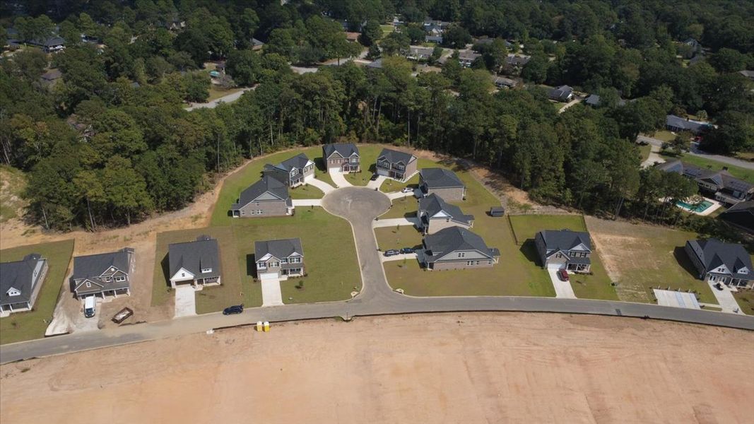 Aerial view of the Heritage Bay community in Sumter, SC, showing layout and nearby surroundings (Image 1).
