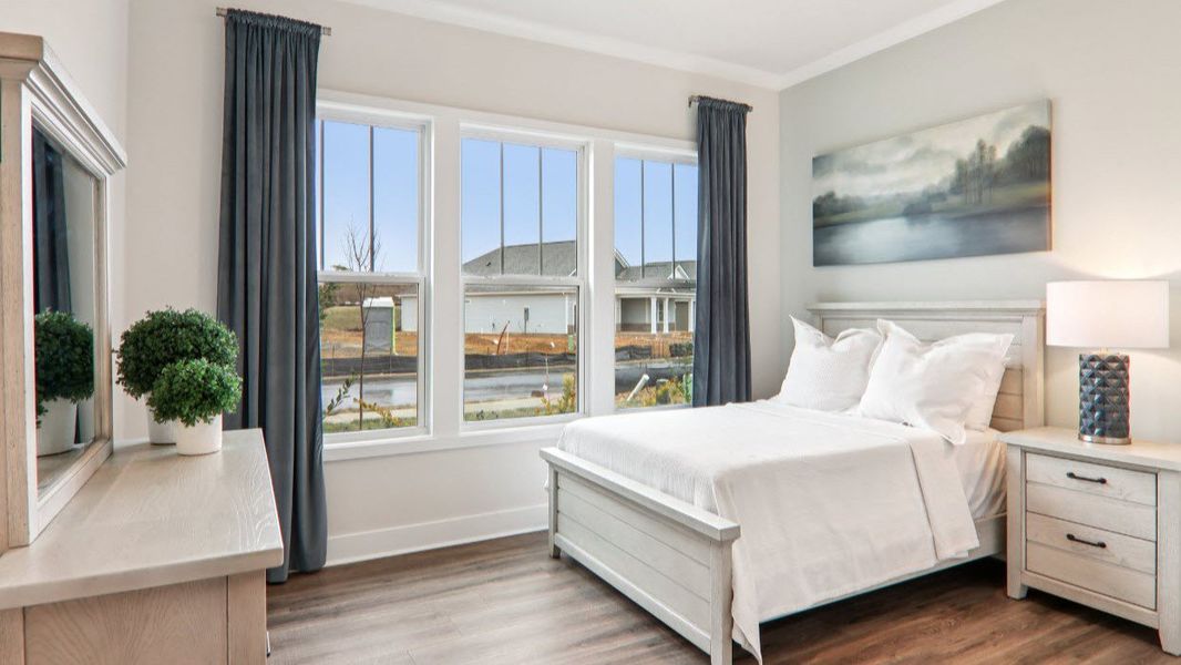 Furnished interior in a model home at Reserve at Tap Root Farms in Fletcher (Image 26).