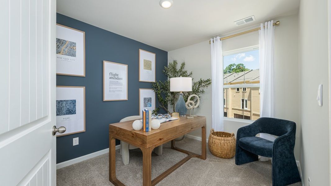 Furnished interior in a model home at Townes at Asbury in Atlanta (Image 13).