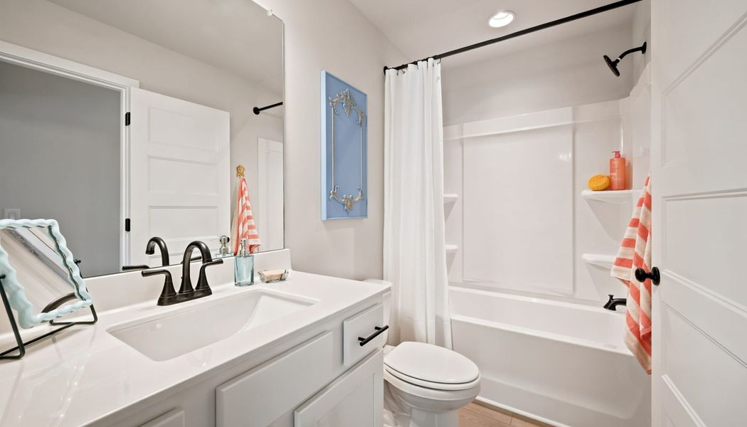 Furnished interior in a model home at Fowler Farms in Auburn (Image 89).