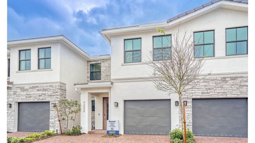 Front exterior of a home in the Vineyards community, located in Davie, FL (Image 9).