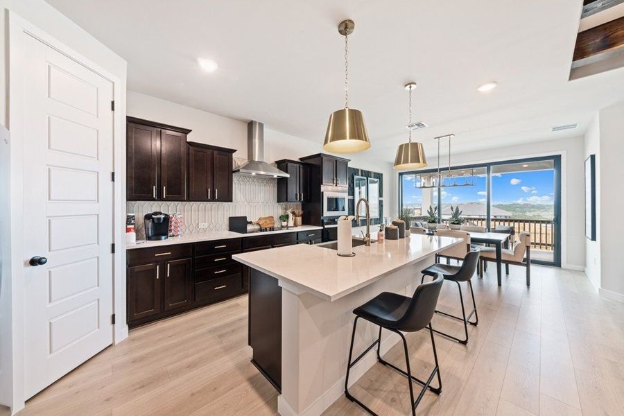 Furnished interior in a model home at The Woodlands in Mico (Image 8).