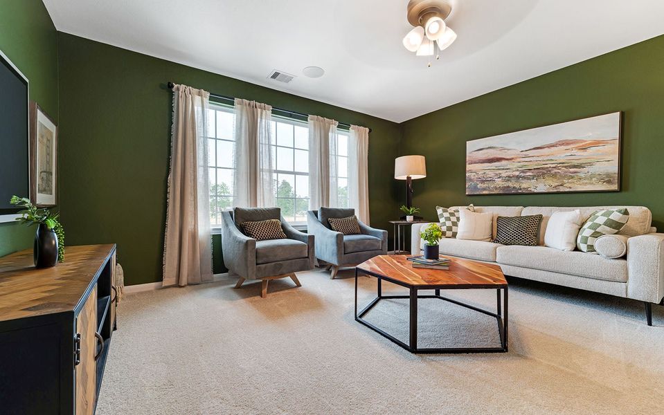 Furnished interior in a model home at The Pines at Seven Coves in Willis (Image 29).