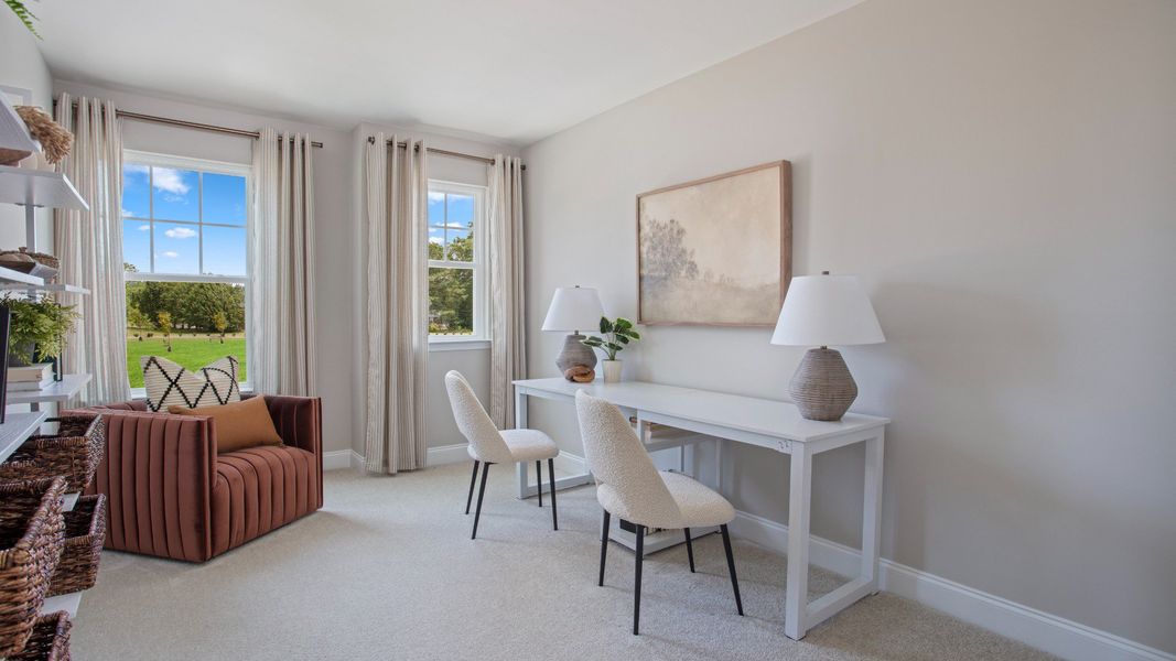 Furnished interior in a model home at Sidney Creek Townhomes in Zebulon (Image 37).