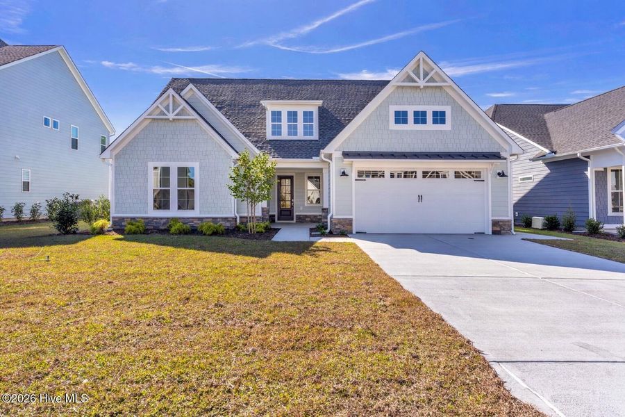 Front exterior of a home in the Windwater community, located in Hampstead, NC (Image 24). Front exterior of a home in the Windwater community, located in Hampstead, NC (Image 24).
