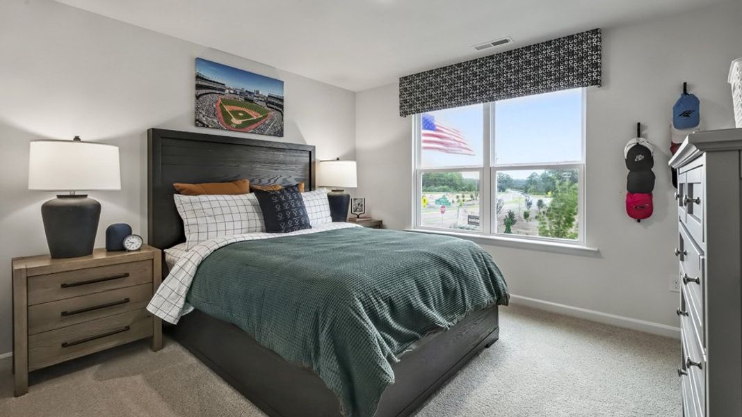 Furnished interior in a model home at Bexford in Willow Spring (Image 16).