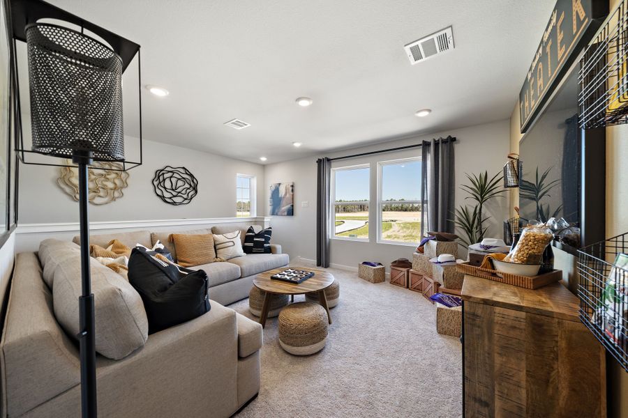 A living room with a large window.