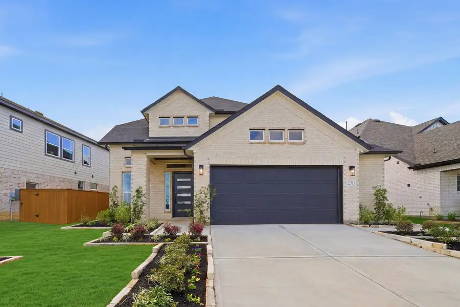 Front exterior of a home in the Wildrye community, located in Waller, TX (Image 2).