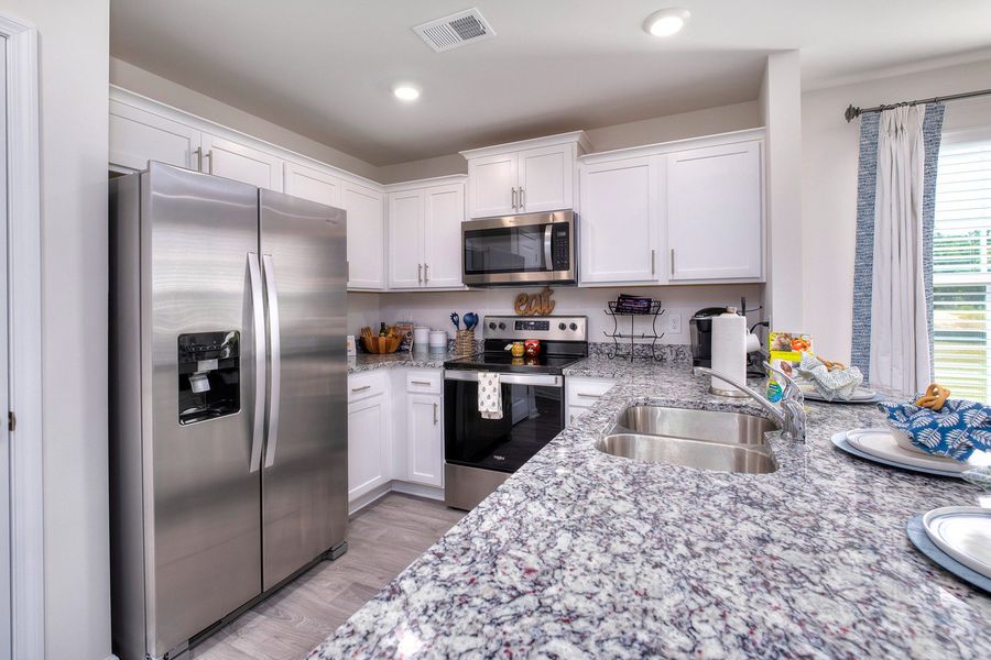 Furnished interior in a model home at Wall Street in Sumter (Image 6).