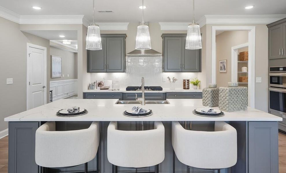 Furnished interior in a model home at Carrington in Stanley (Image 40).