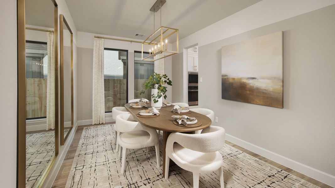 Furnished interior in a model home at Midline 55' in Houston (Image 10).