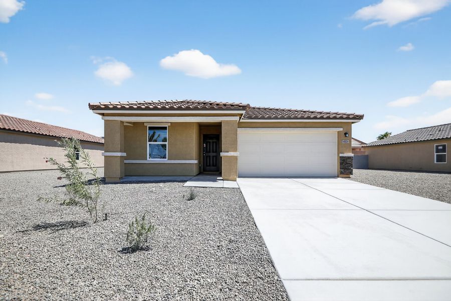 A building with a garage. A building with a garage.