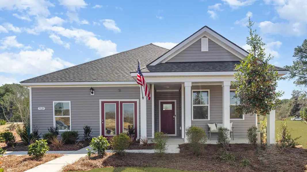 Front exterior of a home in the Meadow Walk community, located in Loris, SC (Image 1).