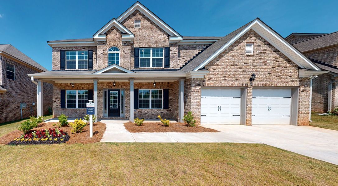 Front exterior of a home in the Oak Mountain View community, located in Carrollton, GA (Image 2). Front exterior of a home in the Oak Mountain View community, located in Carrollton, GA (Image 2).