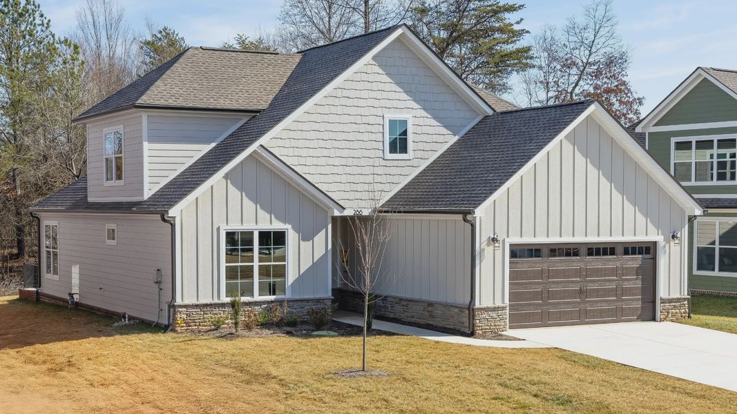 Front exterior of a home in the The Grove at Haven Hill community, located in Lenoir City, TN (Image 12). Front exterior of a home in the The Grove at Haven Hill community, located in Lenoir City, TN (Image 12).