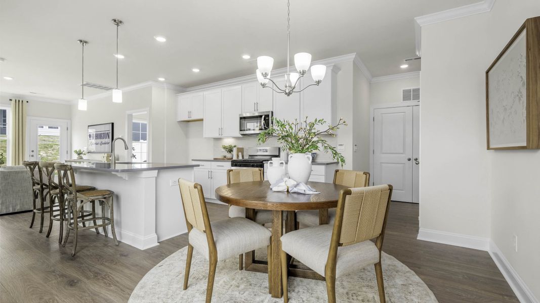 Furnished interior in a model home at The Meadows at Kinsley in Jamestown (Image 12).