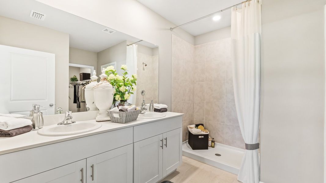 Furnished interior in a model home at Cove at West Port - Tradition in Port Charlotte (Image 29).