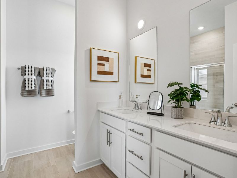 Furnished interior in a model home at Preston Park in Spring Hill (Image 14).