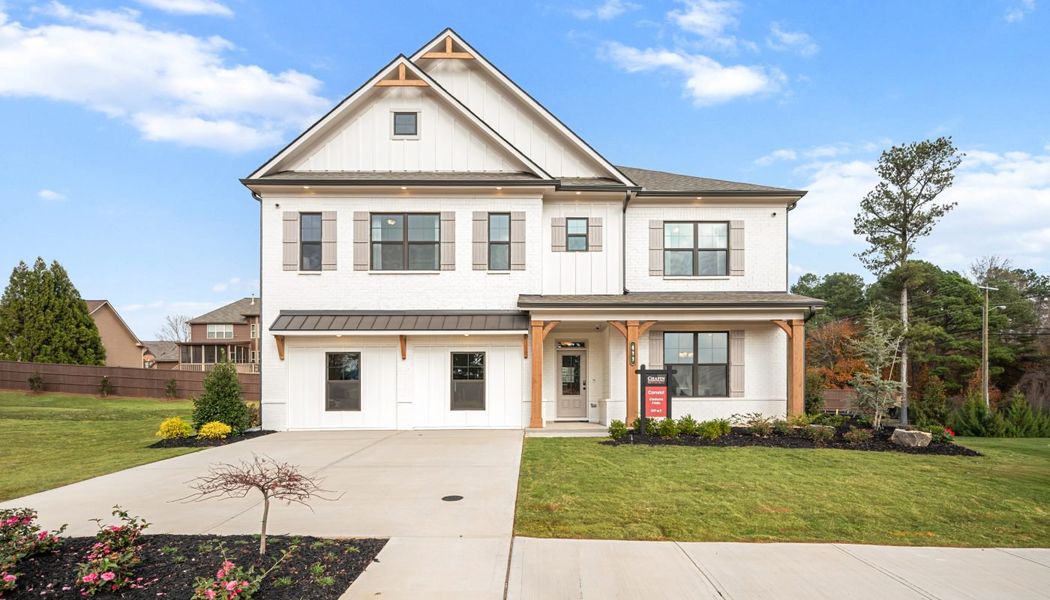Front exterior of a home in the Pinecrest Ridge community, located in Dacula, GA (Image 2).