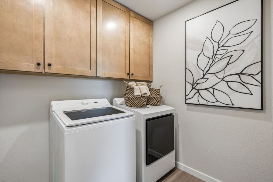 A kitchen with a drawing on the wall. A kitchen with a drawing on the wall.