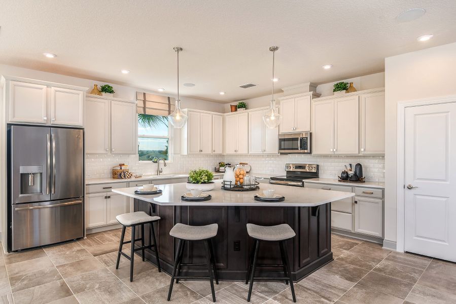 Furnished interior in a model home at John's Lake Landing - Cottage Series in Clermont (Image 7).