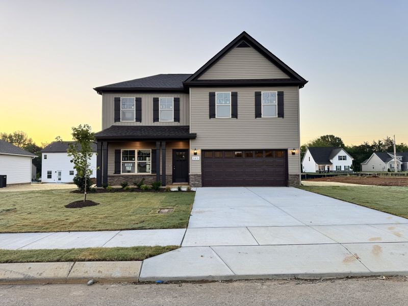 Enjoy a sunrise or sunset on this beautiful covered front porch