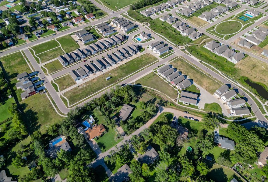 Aerial view of the Heritage Commons community in Andover, KS, showing layout and nearby surroundings (Image 20). Aerial view of the Heritage Commons community in Andover, KS, showing layout and nearby surroundings (Image 20).