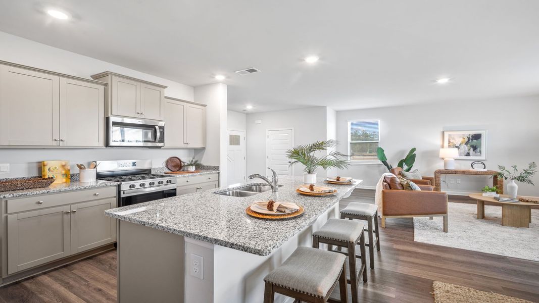 Furnished interior in a model home at The Groves at Bees Creek in Ridgeland (Image 15).