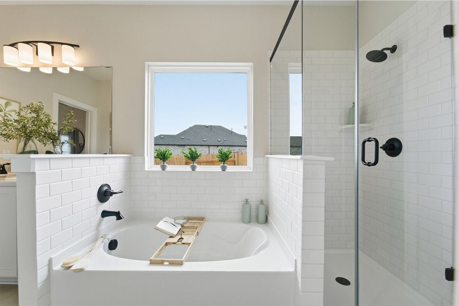 Furnished interior in a model home at Infinity Square in Kyle (Image 29).