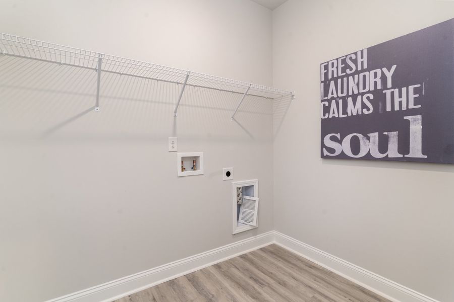 Furnished interior in a model home at Ranch Haven in Murrells Inlet (Image 25).