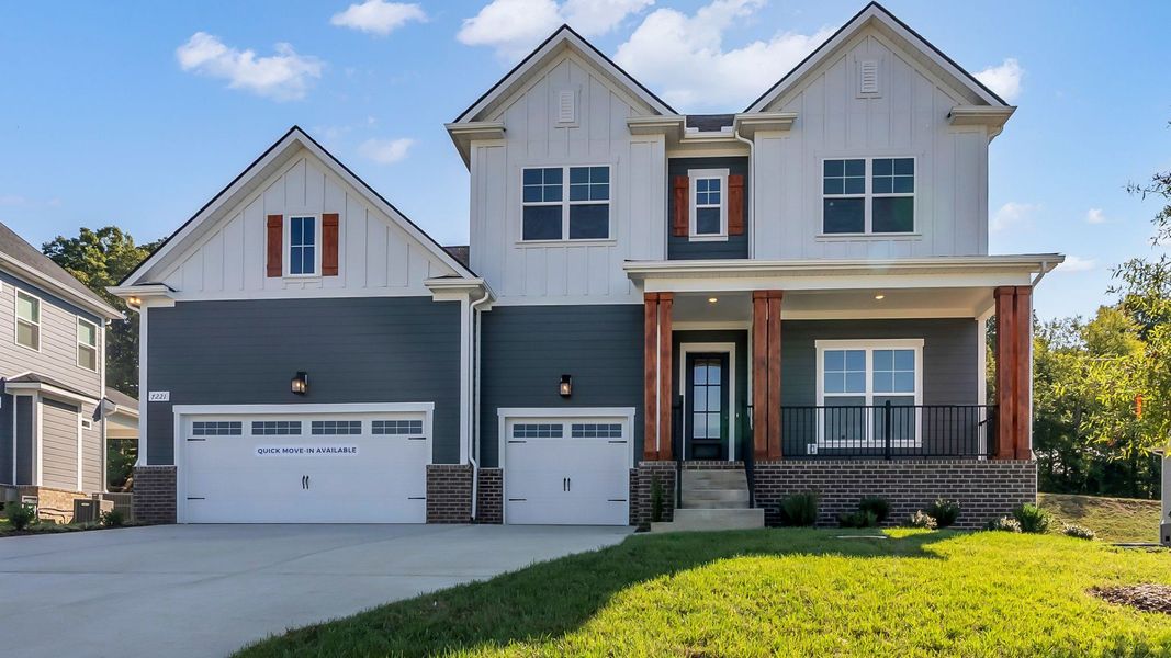 Beautiful front exterior with two color siding and 3-car garage Beautiful front exterior with two color siding and 3-car garage