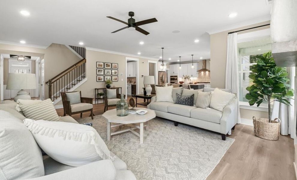 Furnished interior in a model home at Rock Creek in Denver (Image 9).