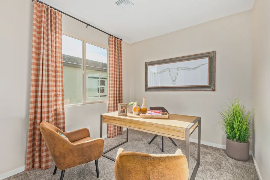 Furnished interior in a model home at Avanti at Granite Vista in Waddell (Image 27).