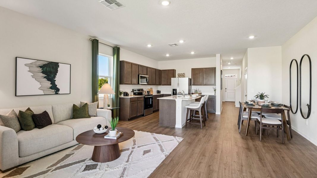 Furnished interior in a model home at Sanctuary at Citrus Park Townhomes in Tampa (Image 16).