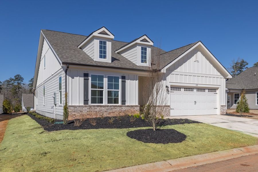 Front exterior of a home in the Enclave at Harbor Club community, located in Greensboro, GA (Image 6).