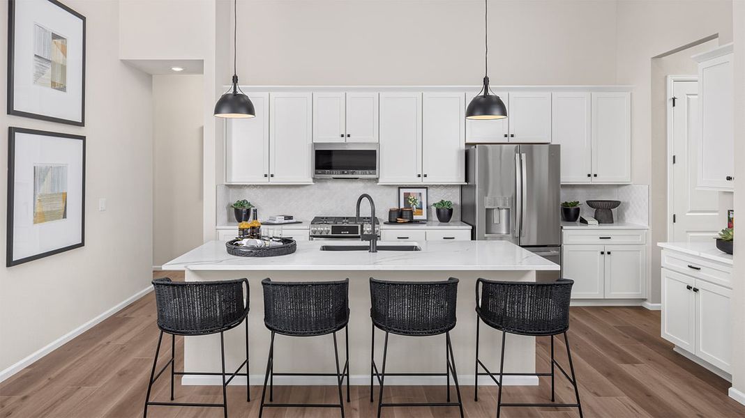 Furnished interior in a model home at The Estates Collection at Talon Pointe in Thornton (Image 9).