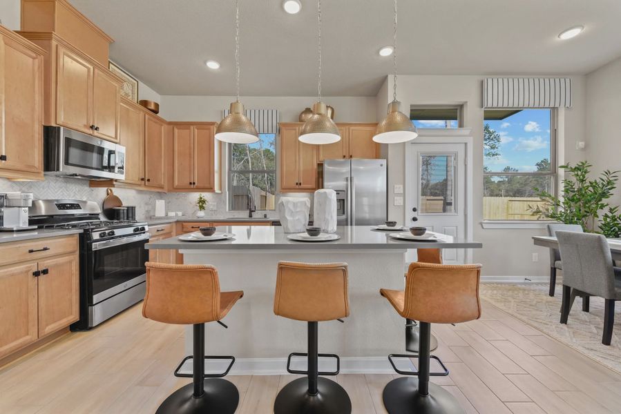 Furnished interior in a model home at The Woodlands Hills in Willis (Image 19).