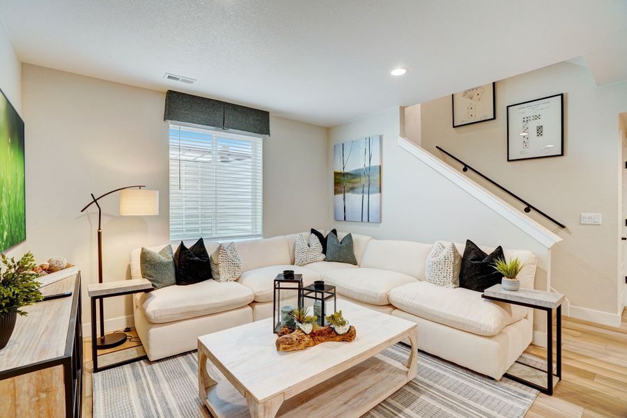 Furnished interior in a model home at Kitchel Lake at Serratoga Falls in Timnath (Image 46).