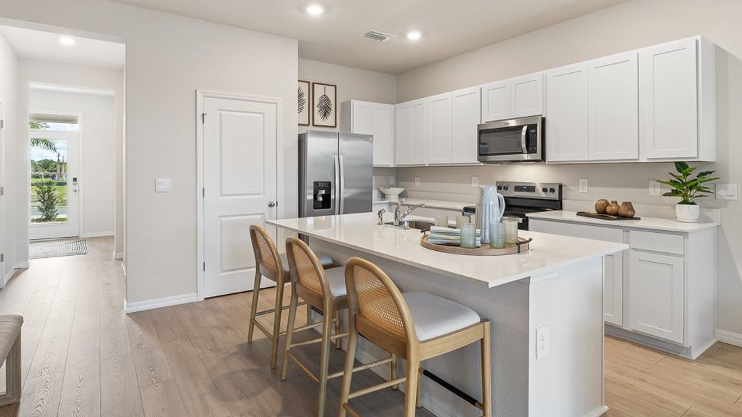 Furnished interior in a model home at The Gardens at Bay Street in Sarasota (Image 9). Furnished interior in a model home at The Gardens at Bay Street in Sarasota (Image 9).