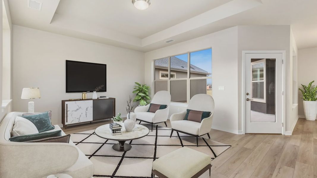 Furnished interior in a model home at The Courtyards at Lupton Village in Fort Lupton (Image 5).